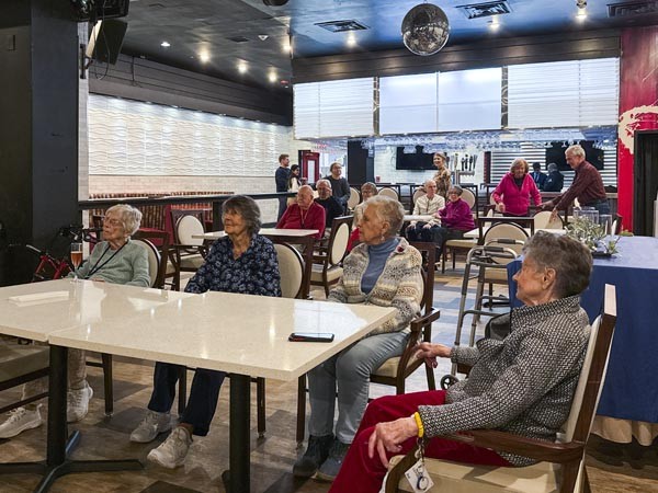 A Group of people watching the show at the Luxury Senior Living in Clinton, NJ