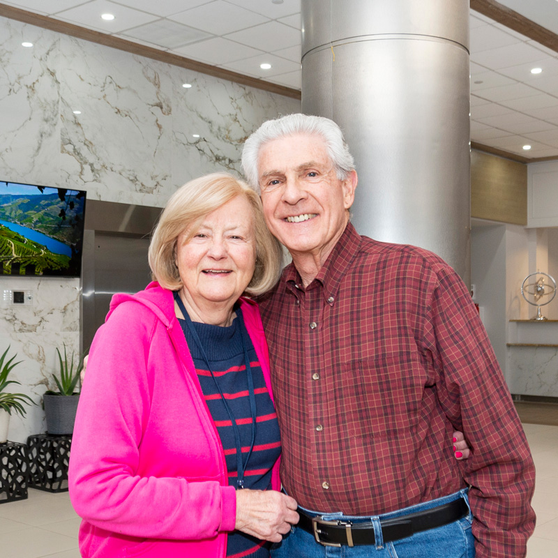 elderly couple smiling