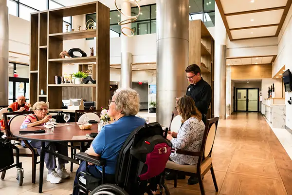 Residents sharing a meal in the Courtyard dining room in Clinton, NJ