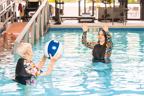 Resident at a water fitness class in the Courtyard pool, Clinton NJ